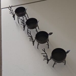 Set of Four Black Metal Reindeer Candle Holders